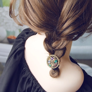 Élastique baroque avec strass colorés sur métal doré pour coiffure élégante tressée