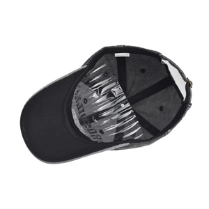 Interior view showing 100% cotton label and structure of the embroidered baseball cap