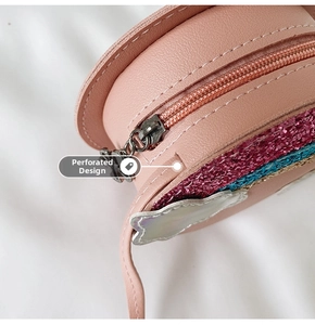 Macro view showing the side stitching and specialized perforated design of this girls purse