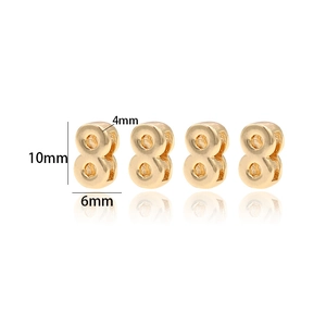 Dettaglio macro di una perla numero 8 dorata da 10mm con dimensioni per gioielli DIY