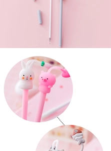 Detailed close-up of cute cartoon pens with soft silicone animal tops and fine point tips