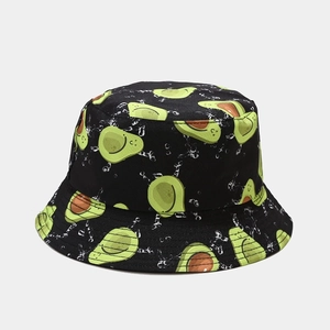 Close-up of black bucket hat featuring smiling avocado fruit prints and cotton texture