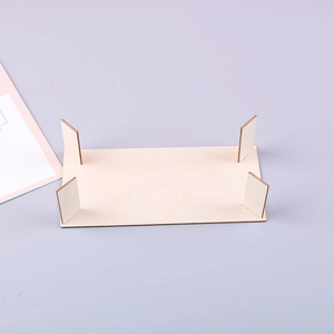 Close-up of the smooth light-colored rectangular wooden base for DIY display stands