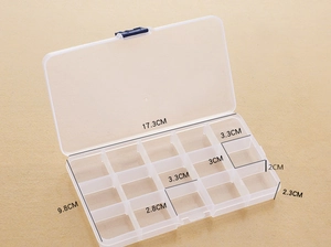 Macro shot of a 15-compartment clear plastic organizer with precise size dimensions