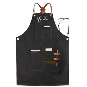 Tablier de travail en denim bleu foncé avec bretelles en cuir réglables et boucles