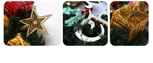Detail view of gold stars, red gift boxes, and pine needles for Christmas wreath decoration