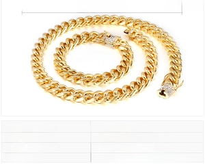 Detailed specs of gold Cuban link chain set with rhinestone dragon clasp and polished finish