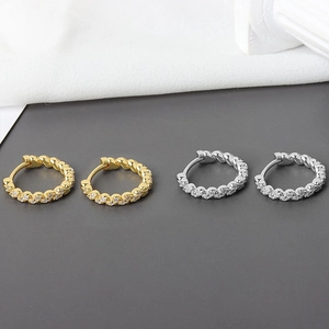 Pair of 925 sterling silver hoop earrings with twisted rope design and sparkling zircon stones
