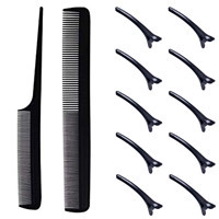 Detail view of professional hair styling set with tail comb, flat comb and clips