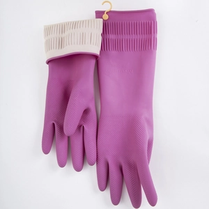 Purple rubber cleaning gloves with beige lining and hanging hooks for kitchen use