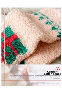 Close-up of thick plush coral fleece texture on Christmas socks with festive patterns