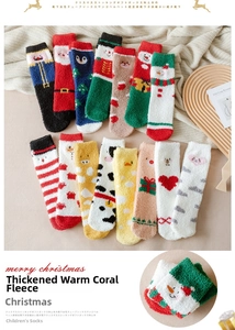 Detail of soft coral fleece Christmas socks featuring festive patterns and thick texture