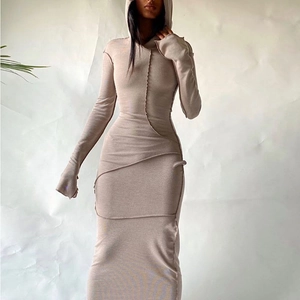 Detail of slim fit long sleeve hooded dress in light khaki with decorative seams
