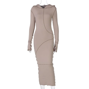 Detail view of khaki long sleeve hooded dress with exposed seams and functional thumbholes