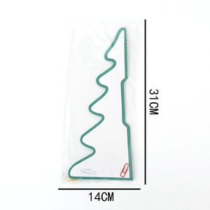 Detail view of green honeycomb Christmas tree decoration measuring 31cm by 14cm