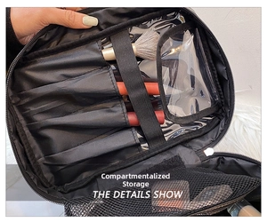 Close-up of travel makeup bag interior with brush slots and transparent PVC compartments