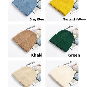 Detailed palette of knit beanies in gray-blue, ginger, khaki, and beige tones
