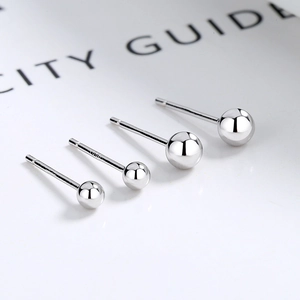 Minimalist S925 sterling silver ball stud earrings in four different gradient sizes