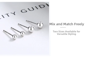 Detailed view of S999 sterling silver ball stud earrings in two different sizes