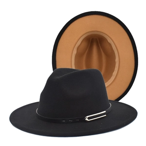 Detail of wool fedora hat with black crown and camel lining including metal buckle leather band