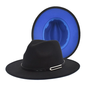 Detail of two-tone wool fedora featuring blue interior and black band with metal buckle