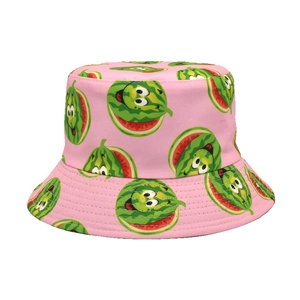 Close-up of pink bucket hat featuring cartoon watermelon prints and breathable cotton fabric