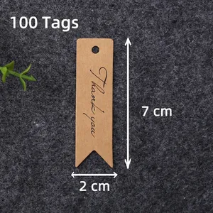 Detailed view of 7x2cm kraft paper swallowtail gift tags with Thank You print