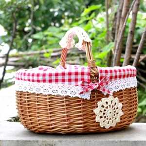 Close-up of woven storage basket with red-white plaid lining and white lace trim