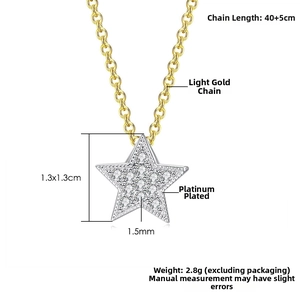 Detail showing paved cubic zirconia star pendant on a light gold cross chain necklace