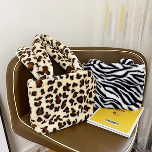 Plush faux fur tote bags in leopard and zebra prints for women winter fashion outfits