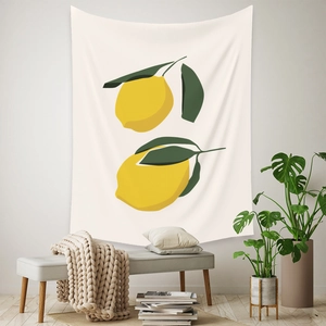 Detail of bohemian lemon tapestry hanging on a white wall in a cozy minimalist room