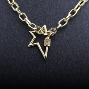 Chunky gold Cuban link necklace with micro-pave zircon star screw clasp fastener