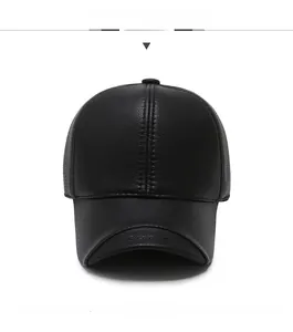 Detail of black leather baseball cap featuring embossed Sport logo on the brim