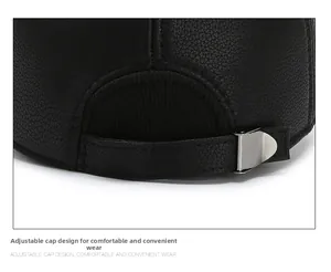Detail of black textured leather baseball cap with adjustable metal strap buckle