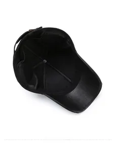 Detail view of the black leather baseball cap interior showing seams and sweatband