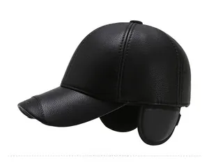 Detail of black leather baseball cap with ear flaps and litchi grain texture
