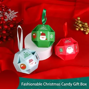 Creative polyhedral Christmas candy boxes in red, green, and blue with silk ribbons