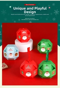 Detail view of octagonal Christmas candy gift boxes with festive patterns and silk ribbons