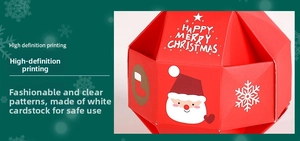 Detail of red Christmas gift box with high-definition printing and Santa Claus motifs