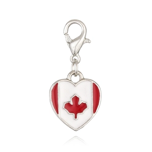 Heart-shaped pendant with enamel Canadian flag maple leaf pattern and lobster clasp