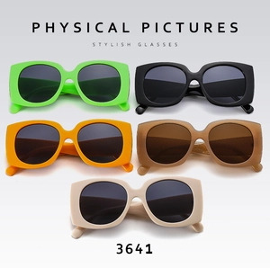 Multiple colors of square oversized sunglasses including green, orange, and classic black