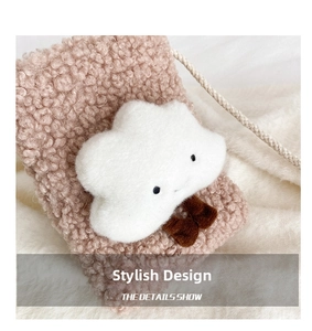 Detail of soft pink fleece crossbody bag featuring a cute white 3D cloud plush doll