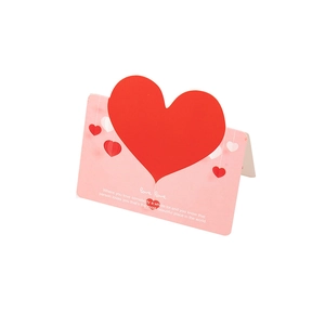 Pink 3D pop-up greeting card featuring a large red heart and romantic text on white background