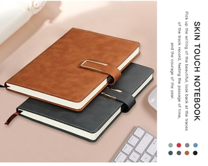 Detail of skin-touch PU leather notebooks with metal buckles and fine stitching accents