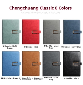 Detailed view of colorful PU leather notebooks featuring elegant U-shaped metal buckles