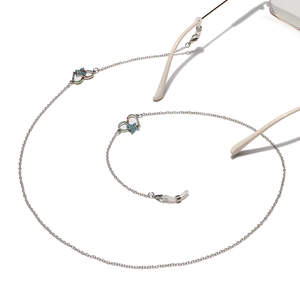 Silver eyewear chain with colorful beads, heart and butterfly charms on white background