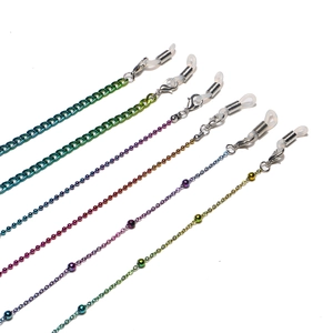 Colorful eyeglass chains with metal beads and non-slip silicone loops on white background