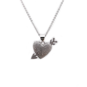 Sparkling silver arrow-through-heart necklace with clear zircon pavé stones on white background