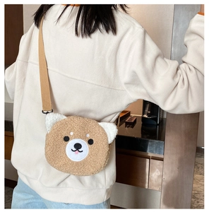 Close-up of cute brown teddy bear plush shoulder bag made of soft lamb wool material