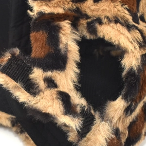 Detail of leopard faux fur baseball cap with black quilted lining and velcro closure